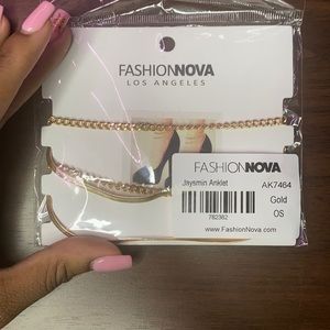 Two connected Gold anklets